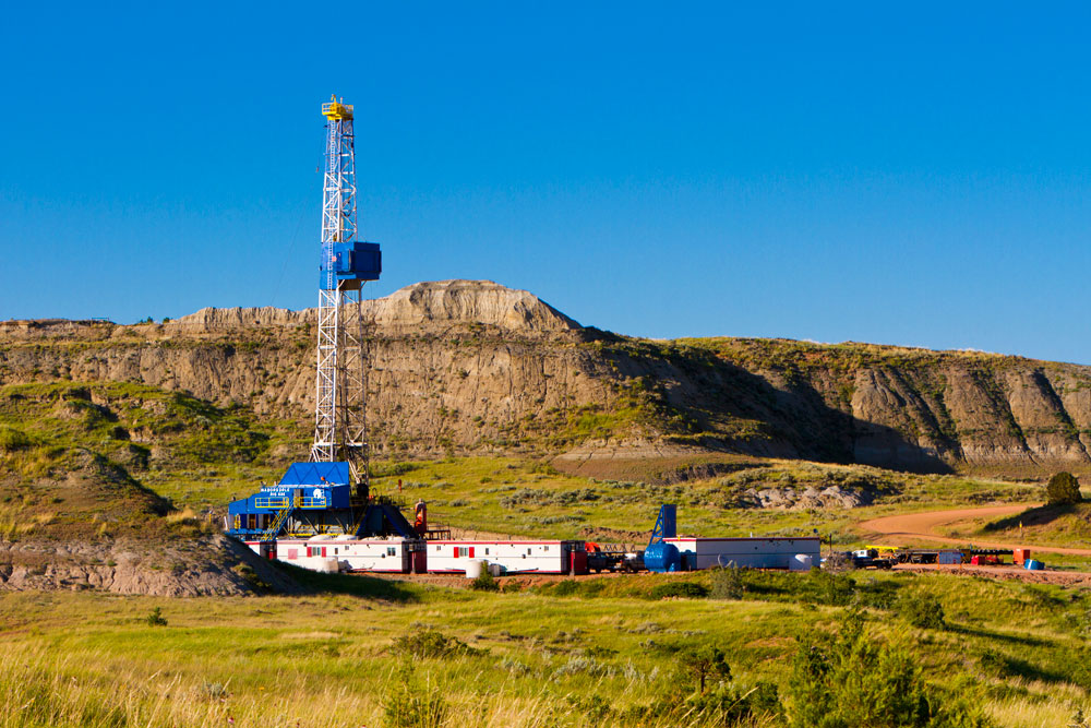 <span class='figure-reader-id'>Rig WCS</span> Drilling a well requires truckloads of materials. Each new oil well needs about 2,000 truck trips back and forth to the well during the first year. Traffic to additional wells on that pad, after the first well, drops to 850 trips. If pipelines would be in place, this could possibly drop down to 250 truck trips. </div> <span class='figure-archive-id'>Photo courtesy of Wyoming Casing Service.</span>