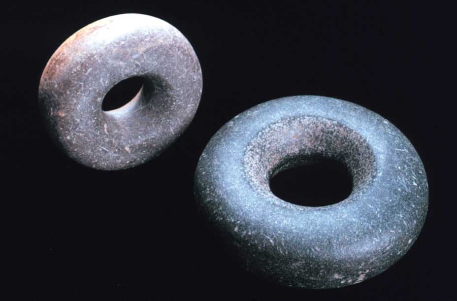 These are donut-shaped Tchung-kee game stones