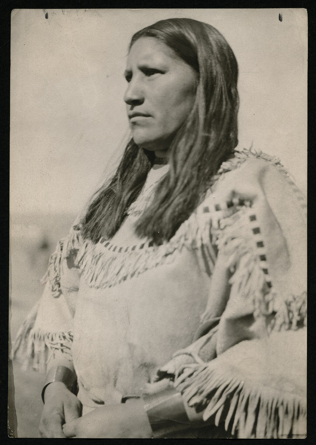 Hannah Leavings, a young woman of the Hidatsa tribe, modeled for the statue of Sakakawea that stands on the state capitol grounds in Bismarck.  She wore the dress given to the State Historical Society by Charles and Carolette Hoffman. SHSND A4415