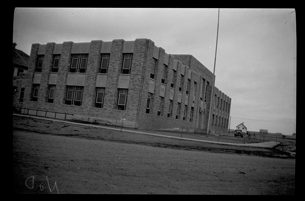 30573-0061. The WPA designed and built the Emmons County Courthouse in Linton. The building replaced a cramped and outdated building. The project provided employment for many local men. The WPA built six other county courthouses in North Dakota during the 1930s. <span class='figure-archive-id'> SHSND 30573-0061.</span>