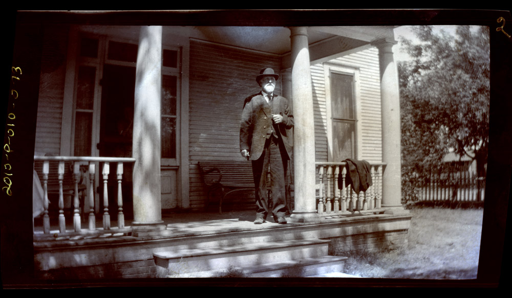 E. E. Heerman outside home in Devils Lake 1919