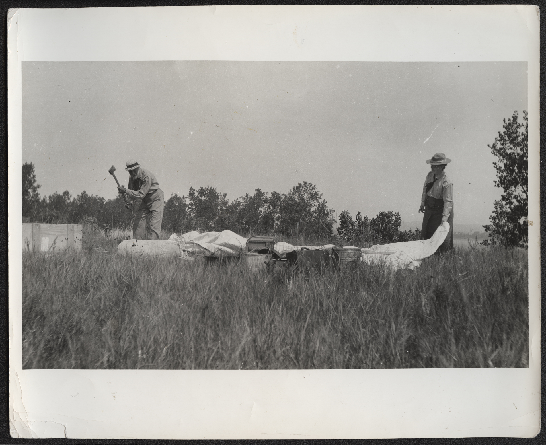 Dr. Charles L. Hall and Frances Densmore making camp near Crows Heart's place.