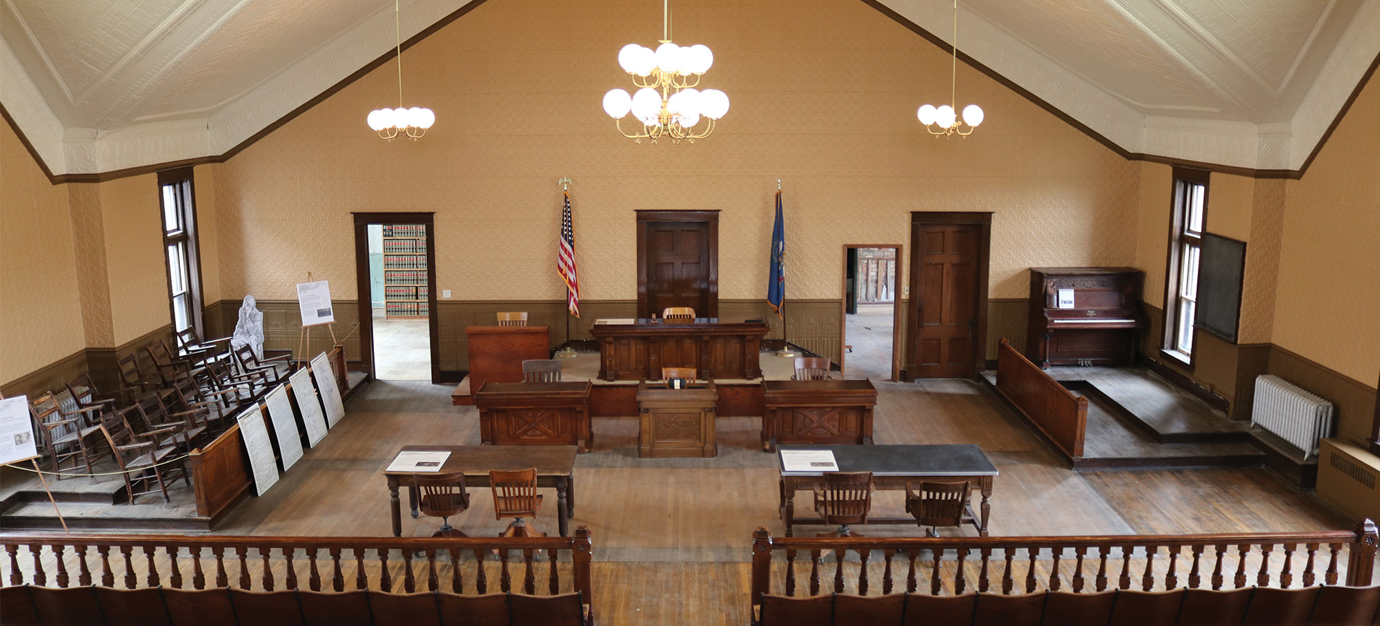 Interior of an old courthouse looking down from the balcony
